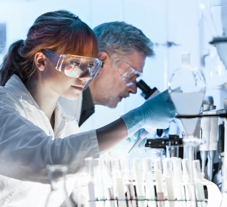 State-of-the-art Laboratory - Professional medical technicians working with modern laboratory equipment